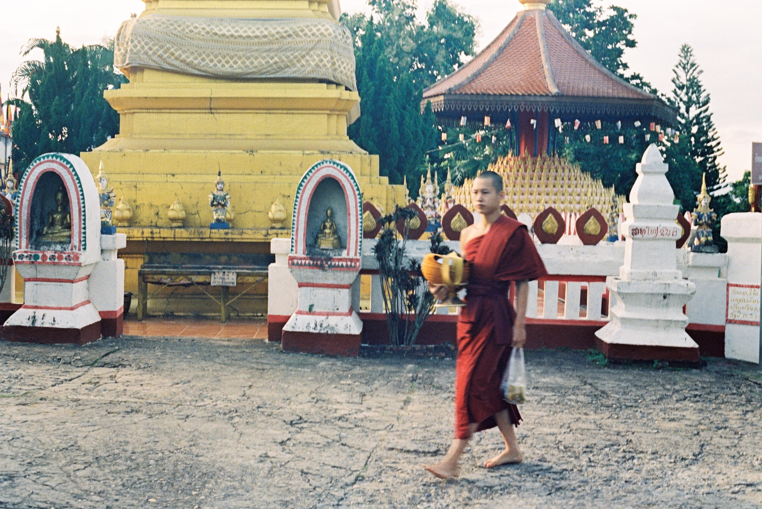 Alms giving, Laos